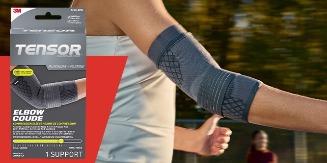 Compression Elbow Sleeve on a person playing tennis.
